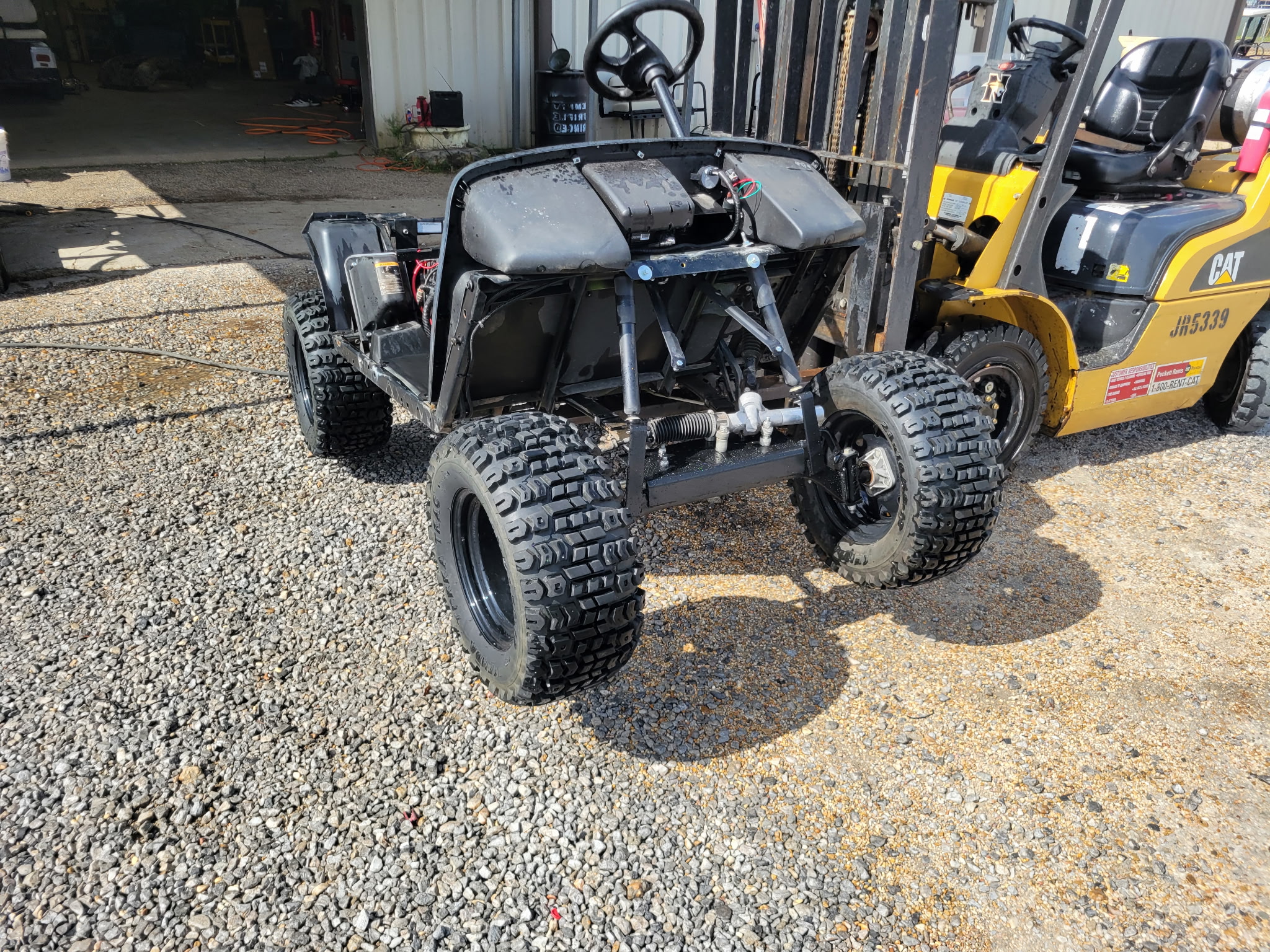 Custom cart front suspension and all-terrain tires